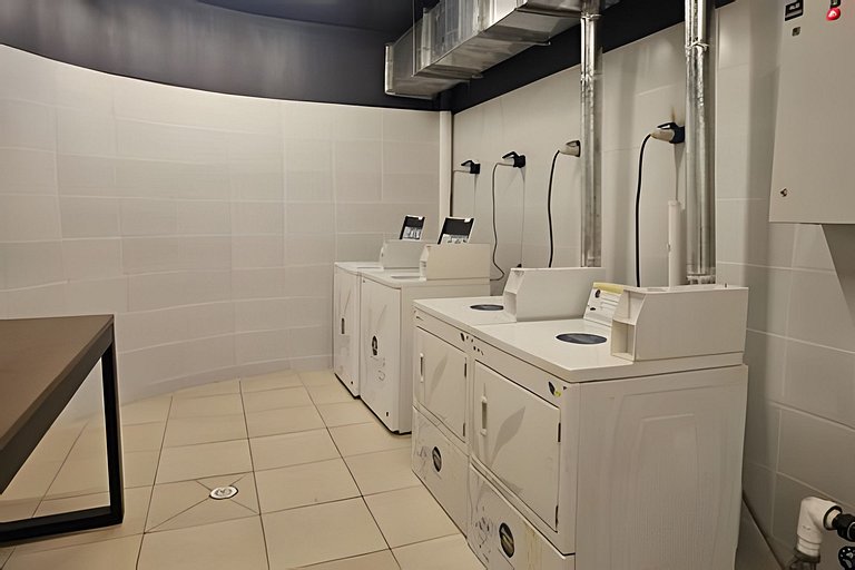 Apartamento no centro de Santiago com piscina e lavanderia R